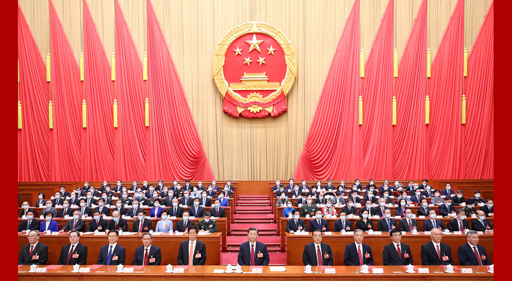 3月13日，第十四屆全國人民代表大會第一次會議在北京人民大會堂閉幕。習近平等黨和國家領導人在主席臺就座。